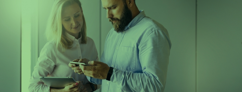 small business onwers looking at device