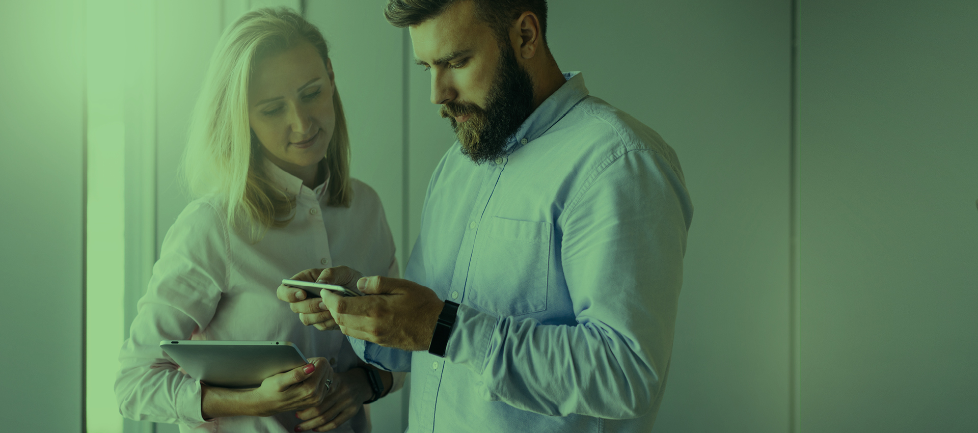 small business onwers looking at device