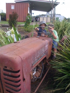 kids on old tractor